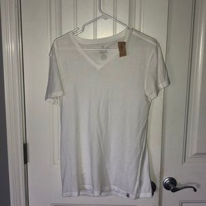 Brand new white V neck